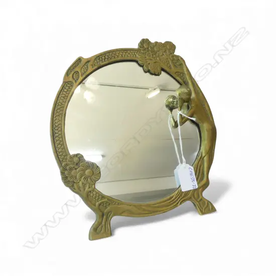CAST BRASS DRESSING TABLE MIRROR with woman looking in. Strut back.H.255mm.