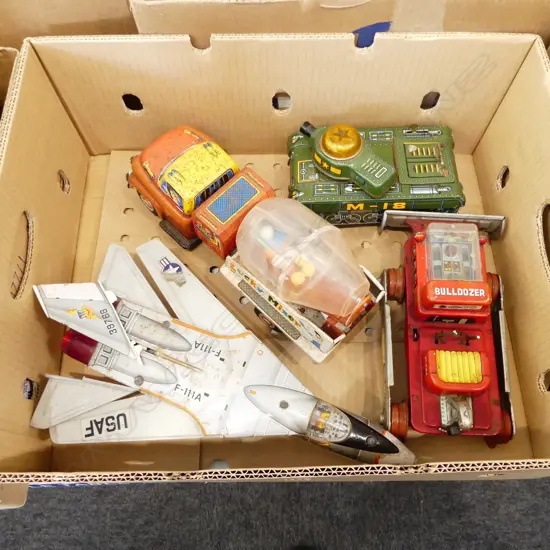 4 VINTAGE TIN/PLASTIC TOYS; TANK, BULLDOZER, LUCKY MIXER & F-111A faults