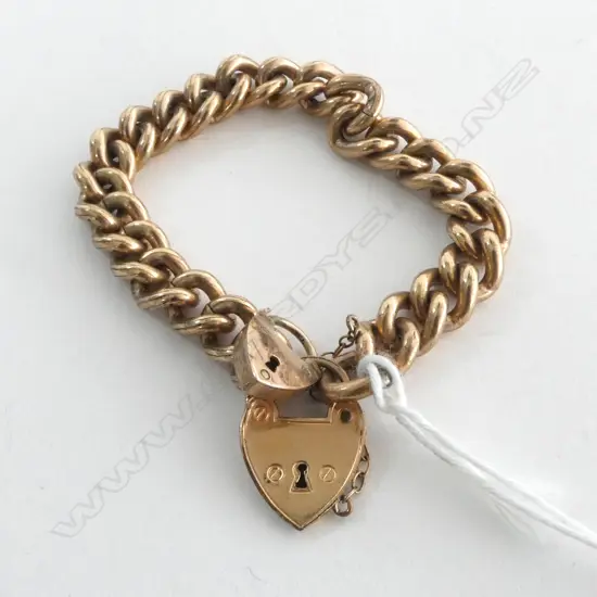9ct GOLD METAL LINED CURB LINK BRACELET (child size) w. SMALL 9ct HEART LOCK, 24.5gm