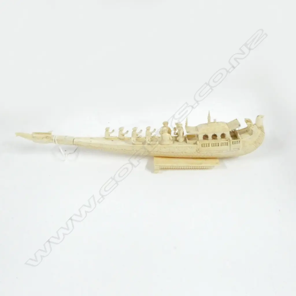 CARVED IVORY ORIENTAL BOAT ON STAND IN NEED OF REPAIR; BROKEN PIECES ACCOMPANING, L340mm Image 1++