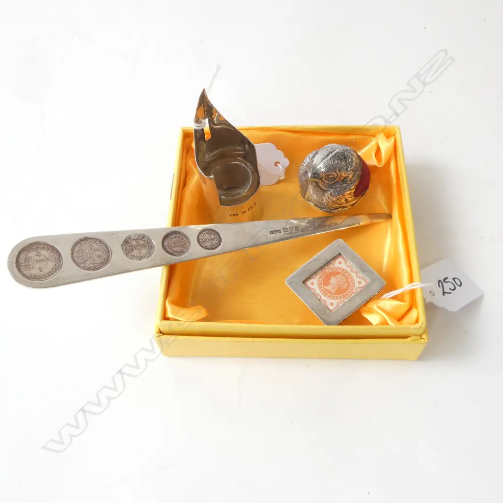 4 PCES STG SILVER; FOUNTAIN NIB FORM INK WELL(16.7gms), SPARROW FORM PIN CUSHION, LETTER OPENER (27.9gms) & STAMP HOLDER Image 1++