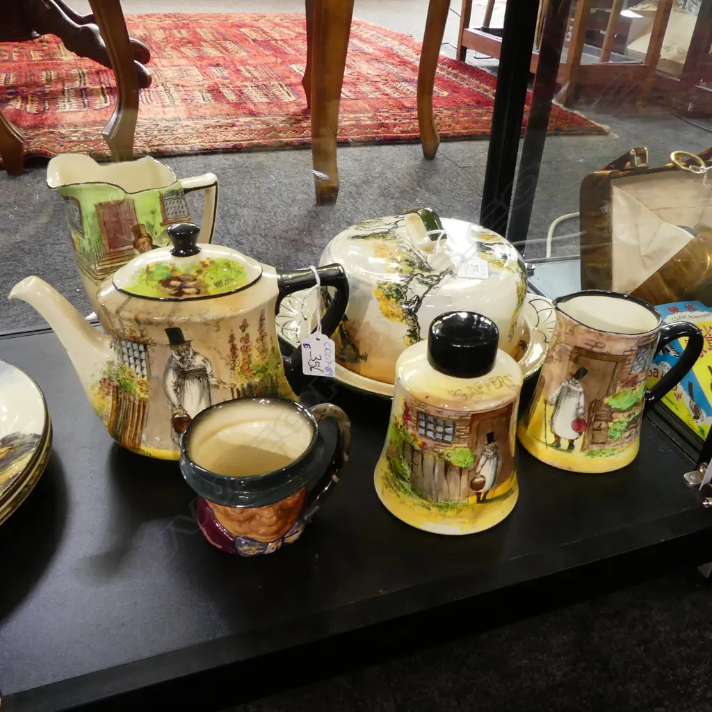 6 PCES ROYAL DOULTON; CHEESE DISH, 'GAFFERS' MILK JUG & TEAPOT & TEA CADDY, 'BARKIS' JUG & CHARACTER JUG H.170mm Image 1++
