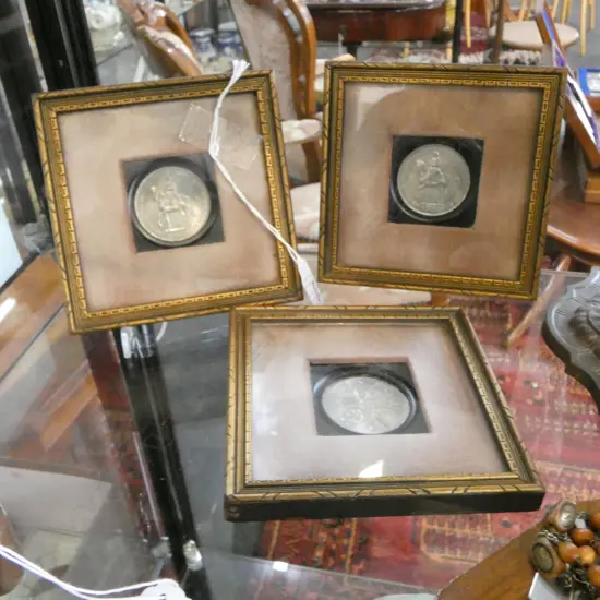 3 FRAMED ELIZABETH II COMEMORATIVE 5 SHILLING COINS