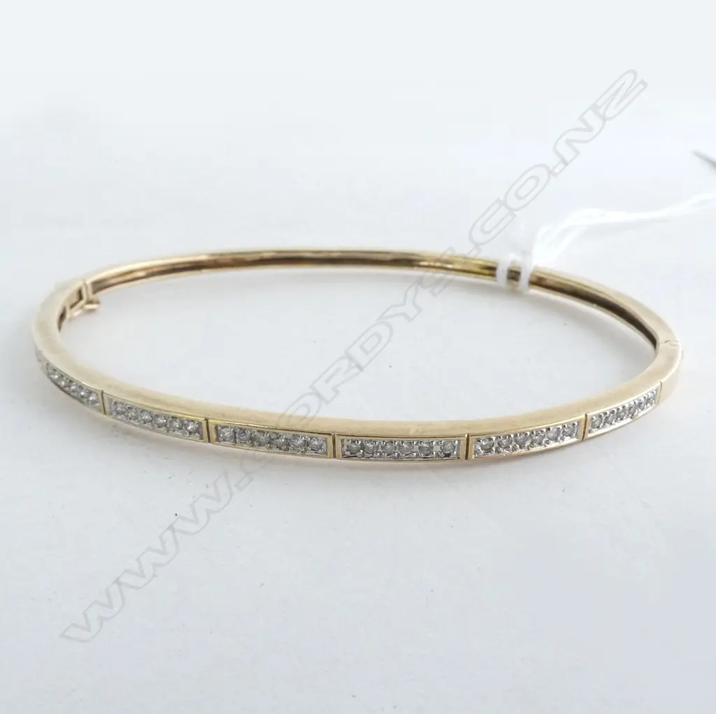 9ct DIAMOND SET BANGLE, Dia. 0.35ct, 7.9gm Image 1++