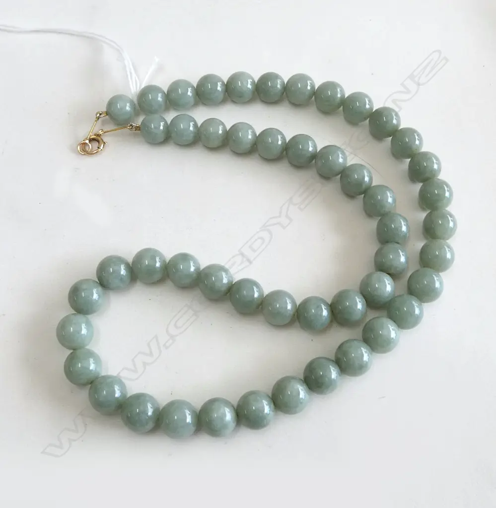 STRING OF JADE BEADS Image 1++