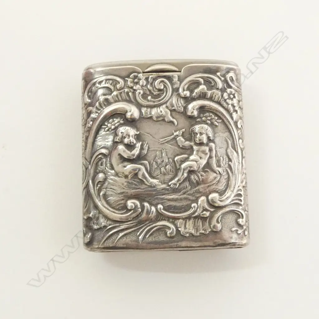 Continental silver embossed VESTA. cherub scene. 'Alpaca' sliding section. striker to end L.50mm Image 1++