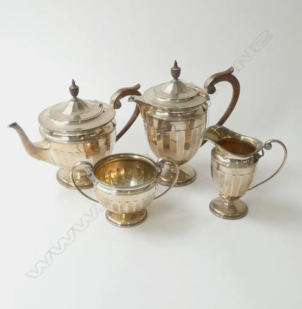 5 PCE SILVER TEA SERVICE includes hot water pot. Fluted body decoration. 1950gms Sheffield 1928 Image 1++