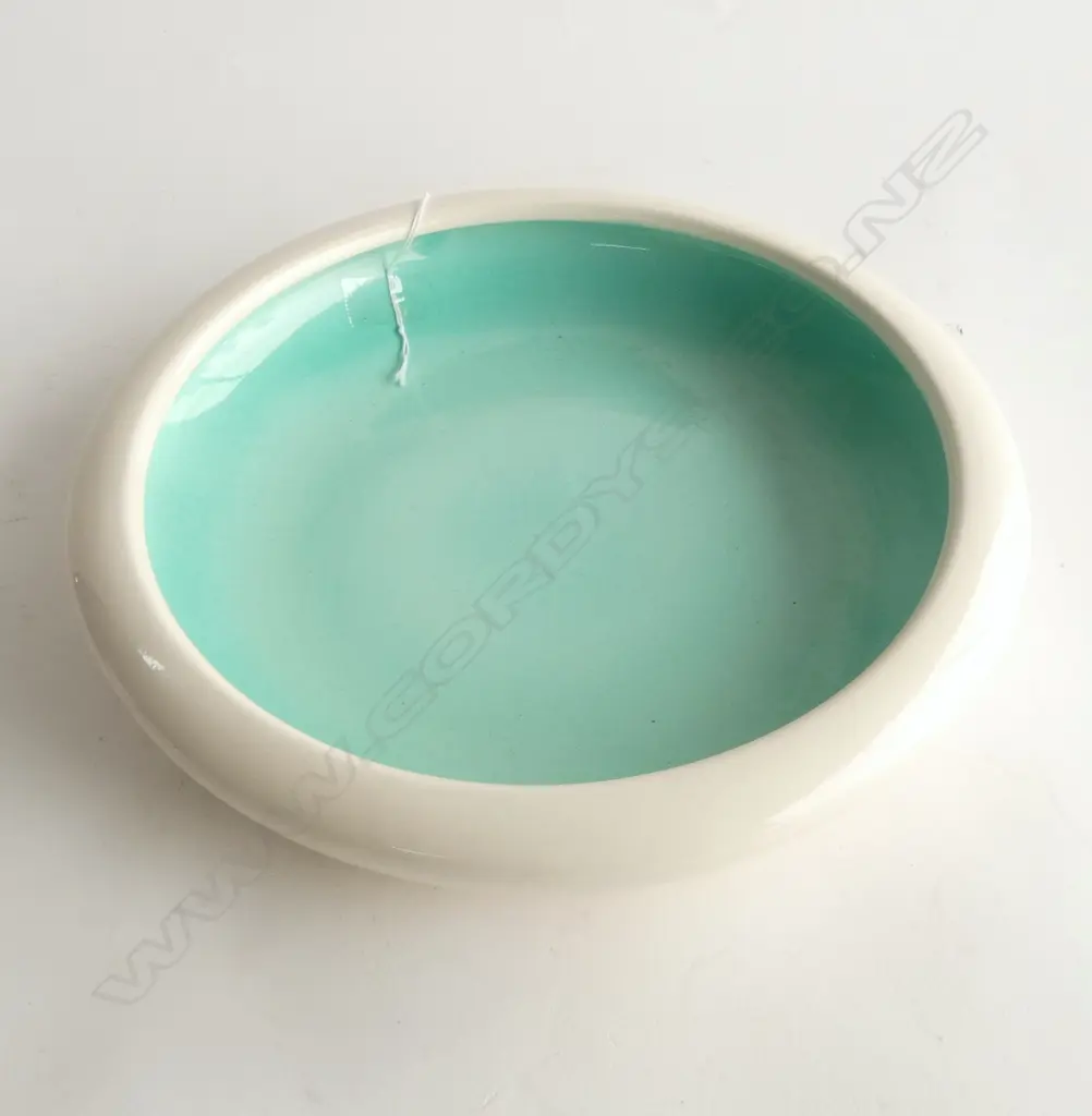 O.C. STEPHENS SHALLOW BOWL; Ivory glaze, internal turqoise glaze, star crack to base, dia.290mm Image 1++