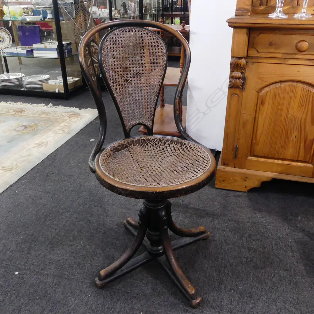 ANTIQUE BENTWOOD SWIVEL CHAIR, CANE AF Image 1++