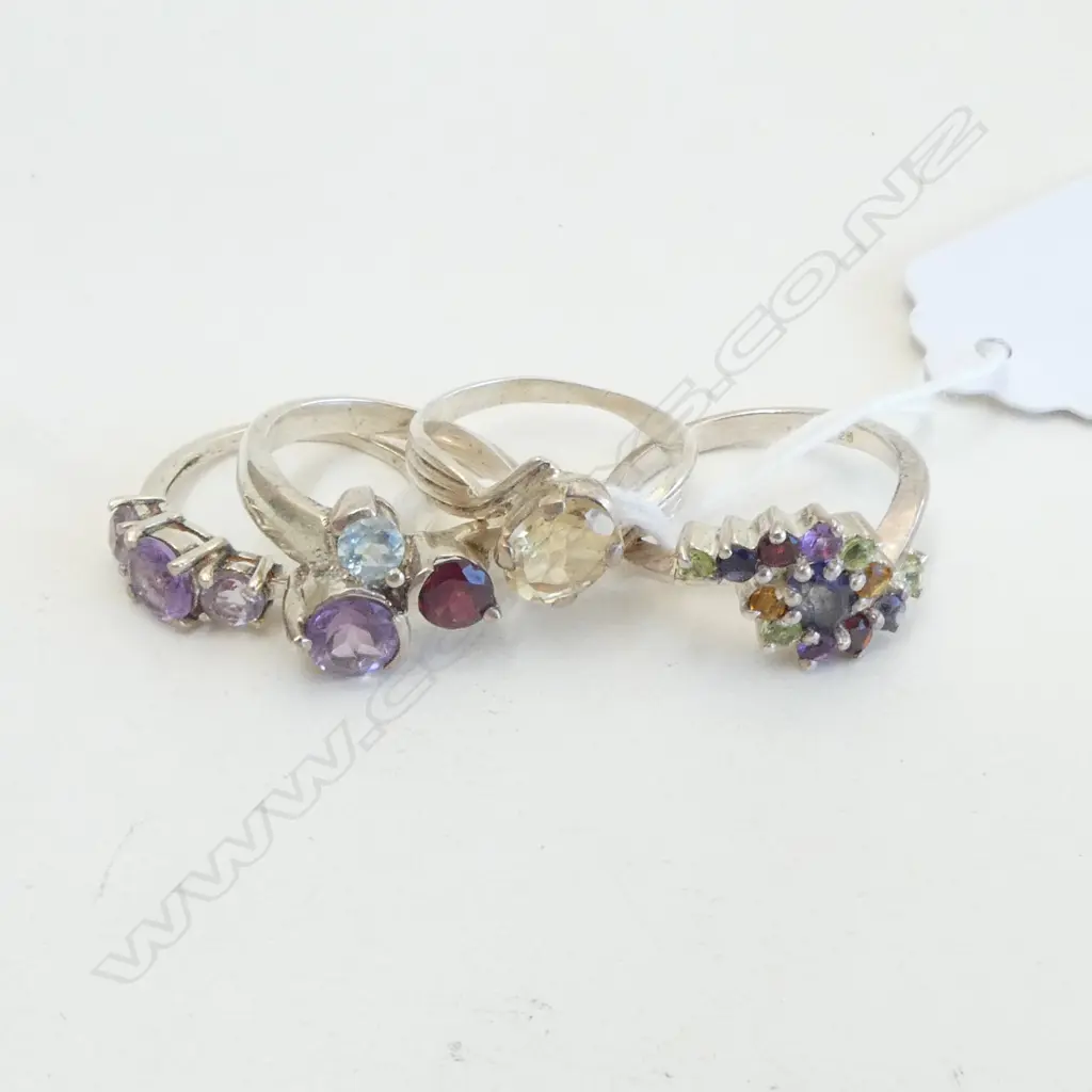 FOUR SILVER & SEMI PRECIOUS STONE RINGS Image 1++