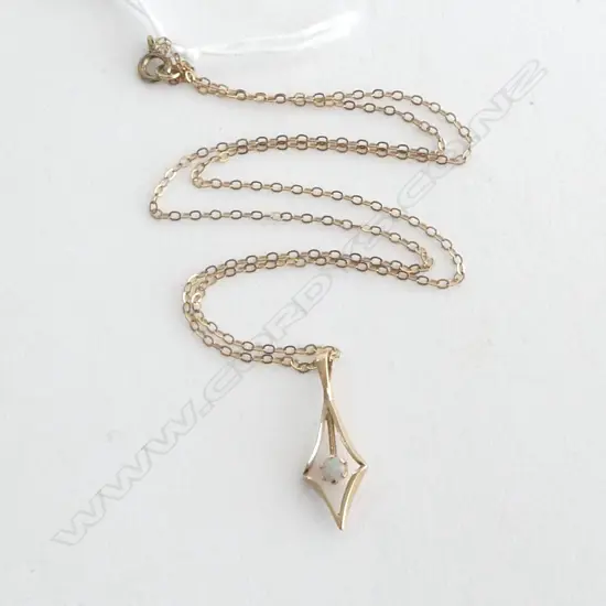 9ct GOLD & OPAL PENDANT 0.8gm ON PLATED NECKLACE