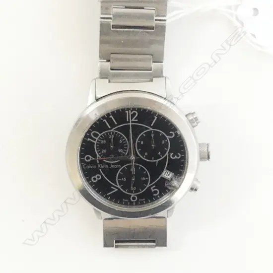 CALVIN KLEIN JEANS GENT'S WRISTWATCH: Damaged glass