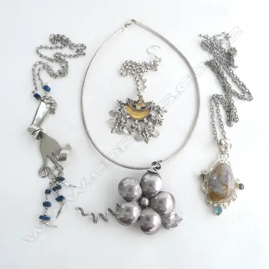 4 FANCY PENDANT NECKLACES some silver 