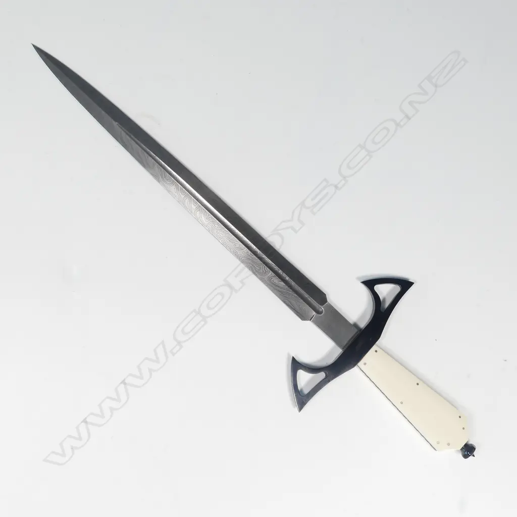 MODERN FISHTAIL GOTHIC DAGGER, DAMASCUS STEEL BLADE, BLUED STEEL GUARD, IVORY GRIPS. MARKED 'DARK WATER KNIVES' L.480mm Image 1++