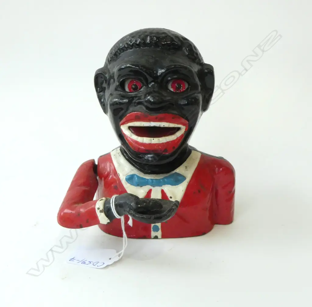 EARLY 20thC MONEY BANK by Sydenham & McCoustra Co. Red jacket. Old advertisement also attached for a similar bank Image 1++