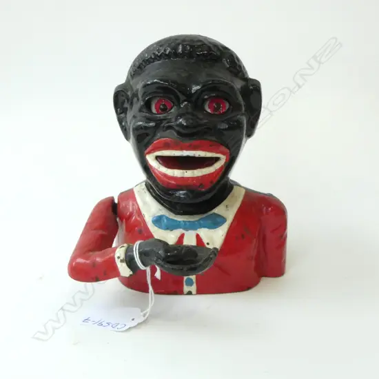 EARLY 20thC MONEY BANK by Sydenham & McCoustra Co. Red jacket. Old advertisement also attached for a similar bank