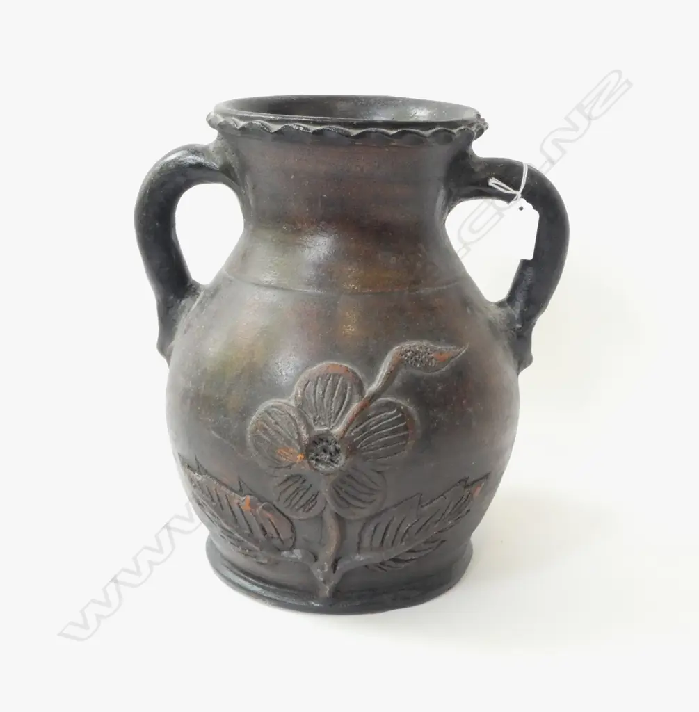 LARGE TERRACOTTA WHO HANDLED ISIS JUG WITH SERPENTINE OPENING & FLORAL APPLED DETAIL, H.  Image 1++