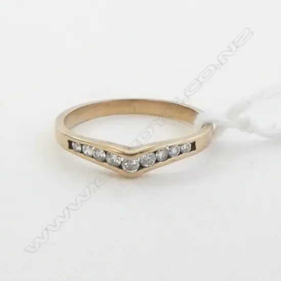 9ct GOLD & DIAMOND CHANNEL SET BAND RING size K1/2