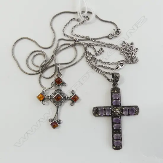 2 S/SILVER CRUCIFIX  ONE WITH AMETHYST STONES THE OTHER WITH AMBER ON SILVER CHAINS 