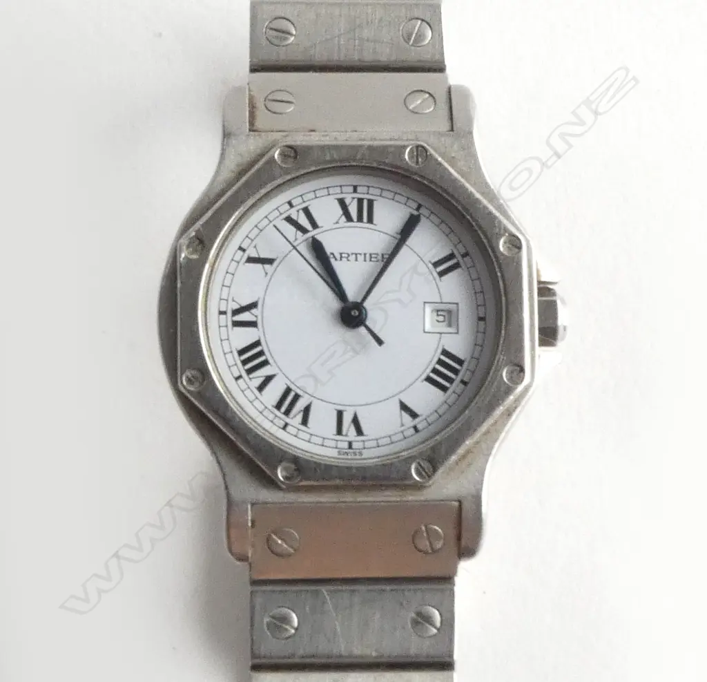 CARTIER AUTOMATIC WRISTWATCH; Ladies size (3cm width)With card dating 31/7/80, no. & type rubbed off. Image 1++