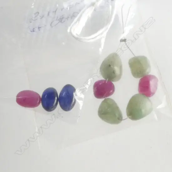 9 LOSE BEADS; 3 x RUBY, 2 x SAPPHIRE & 4 x EMERALD BEADS