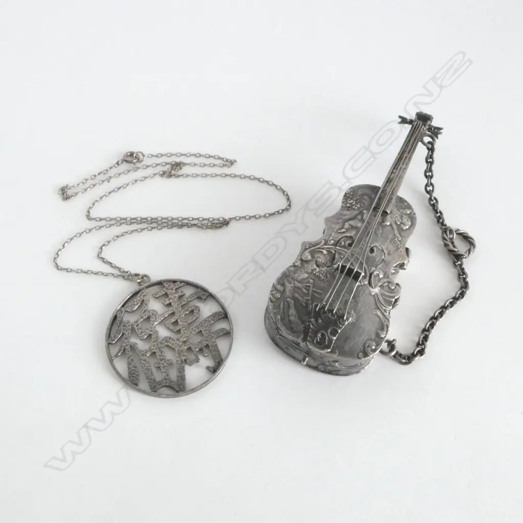 IMPORT 930. SILVER CELLO 46.14gms w. CHINESE PENDENT Image 1++