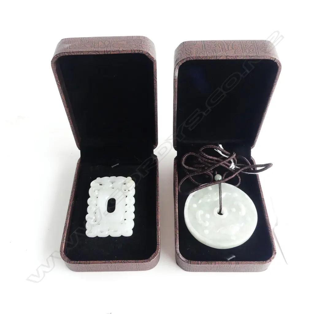 2 ORIENTAL JADE PENDANTS, each cased 55mm dia Image 1++