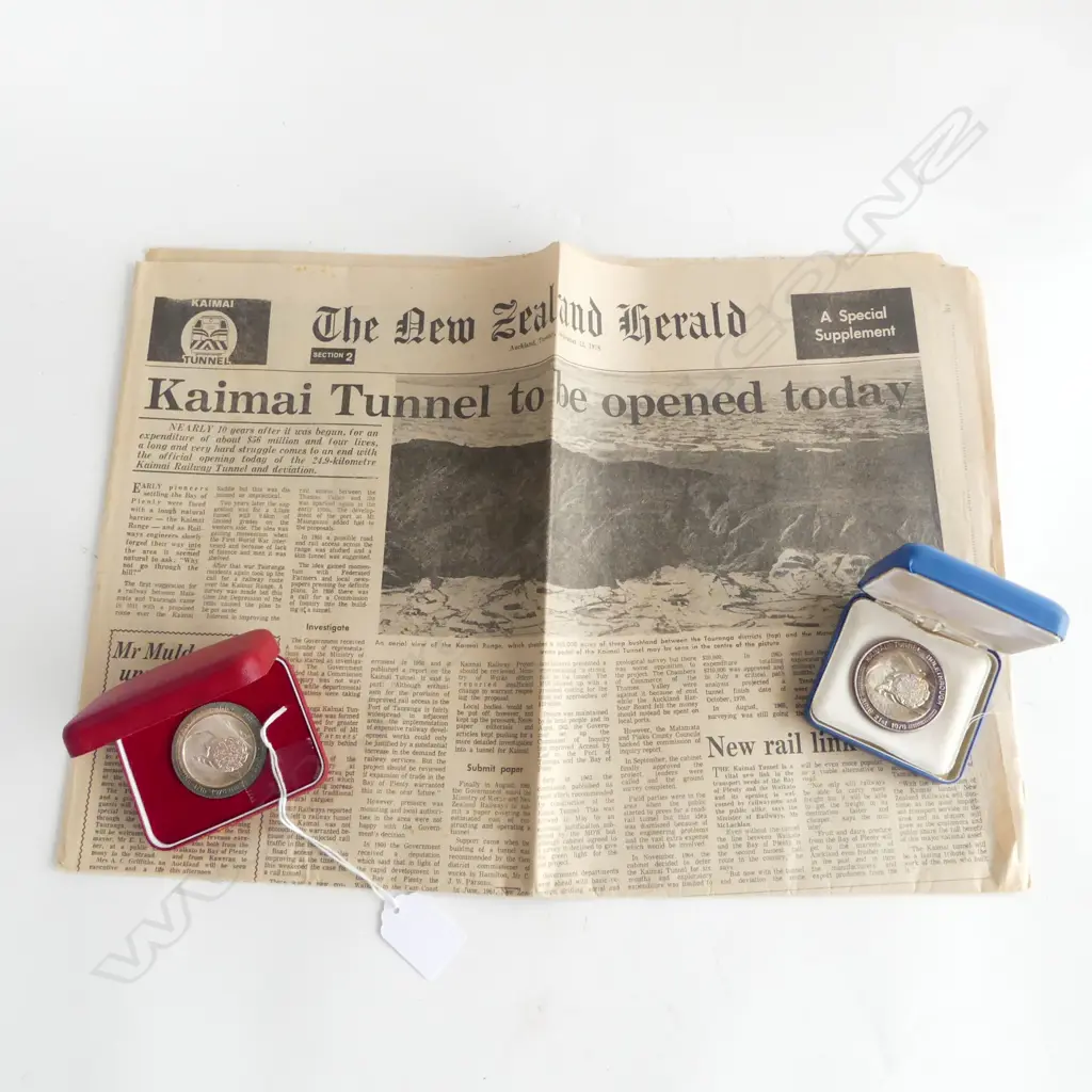 KAIMAI TUNNEL COM. MEDALLIONS w. NEWSPAPER; JUNE 17th & 21st 1976, one is ed. 954/2000 Image 1++