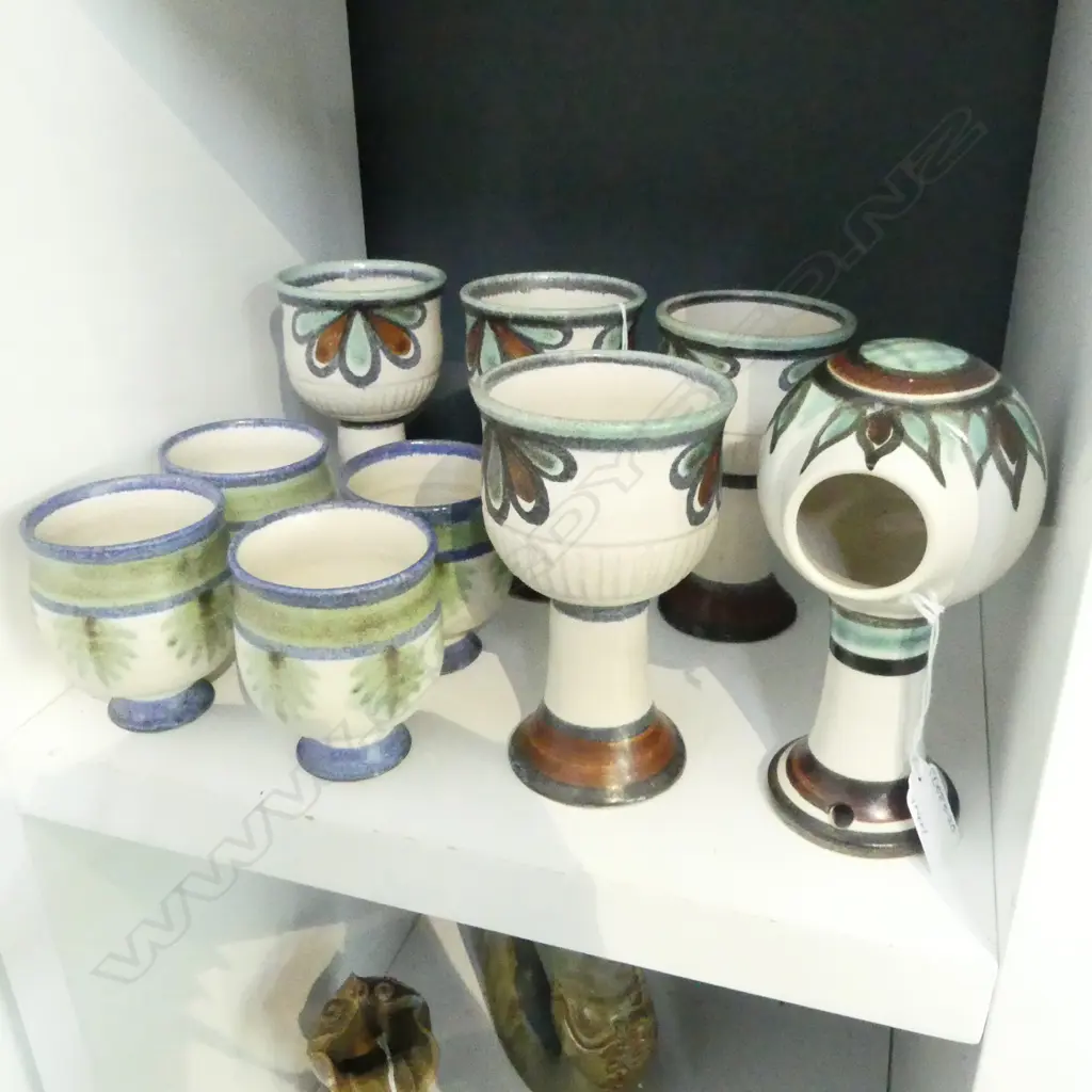 9 PCES ANNEKE BORREN N.Z. STUDIO POTTERY; 4 GOBLETS, 4 CUPS & SML. WALL PLANTER Image 1++