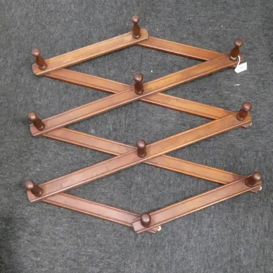CONCERTINA HAT RACK