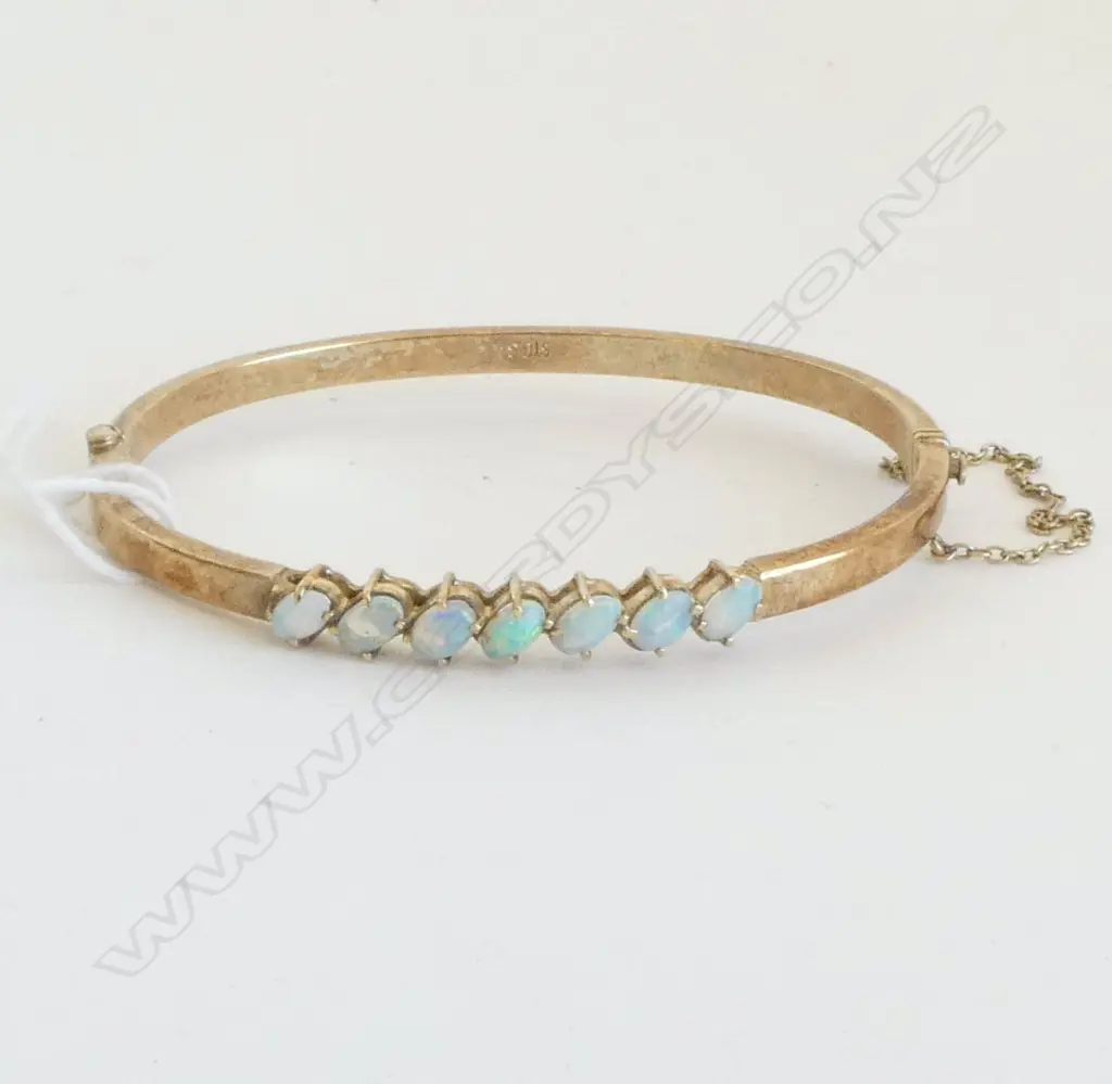 SILVER GILT & 7 OPAL HINGED BANGLE Image 1++