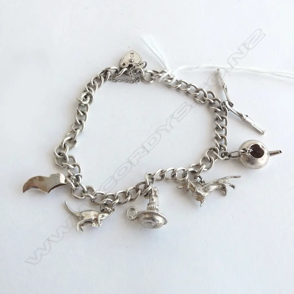 SILVER CHARM BRACELET, 24.6gm Image 1++