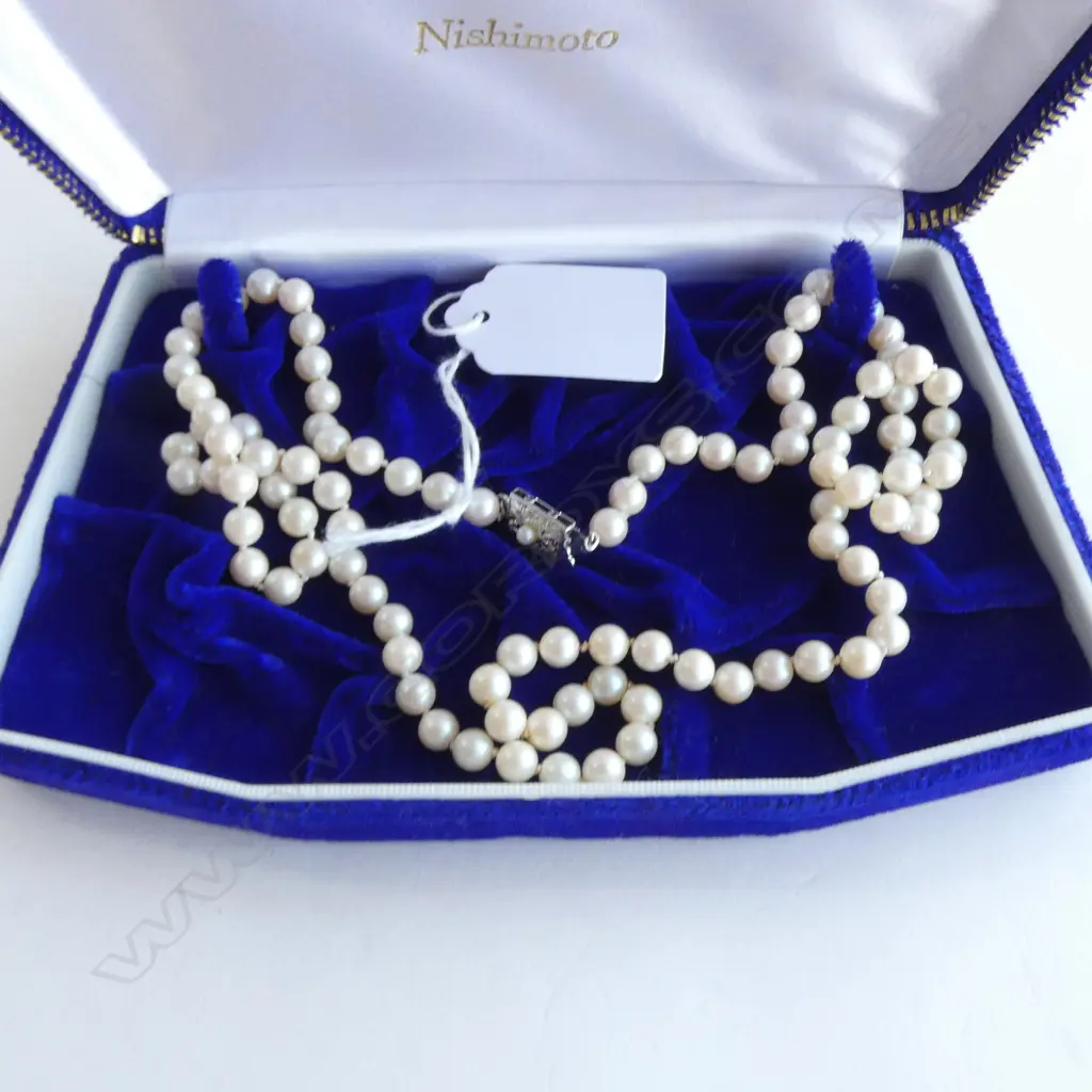 STRAND UNIFORM HIGH LUSTRE CULTURED NISHIMOTO PEARLS individually knotted w silver clasp. L.660mm. Image 1++