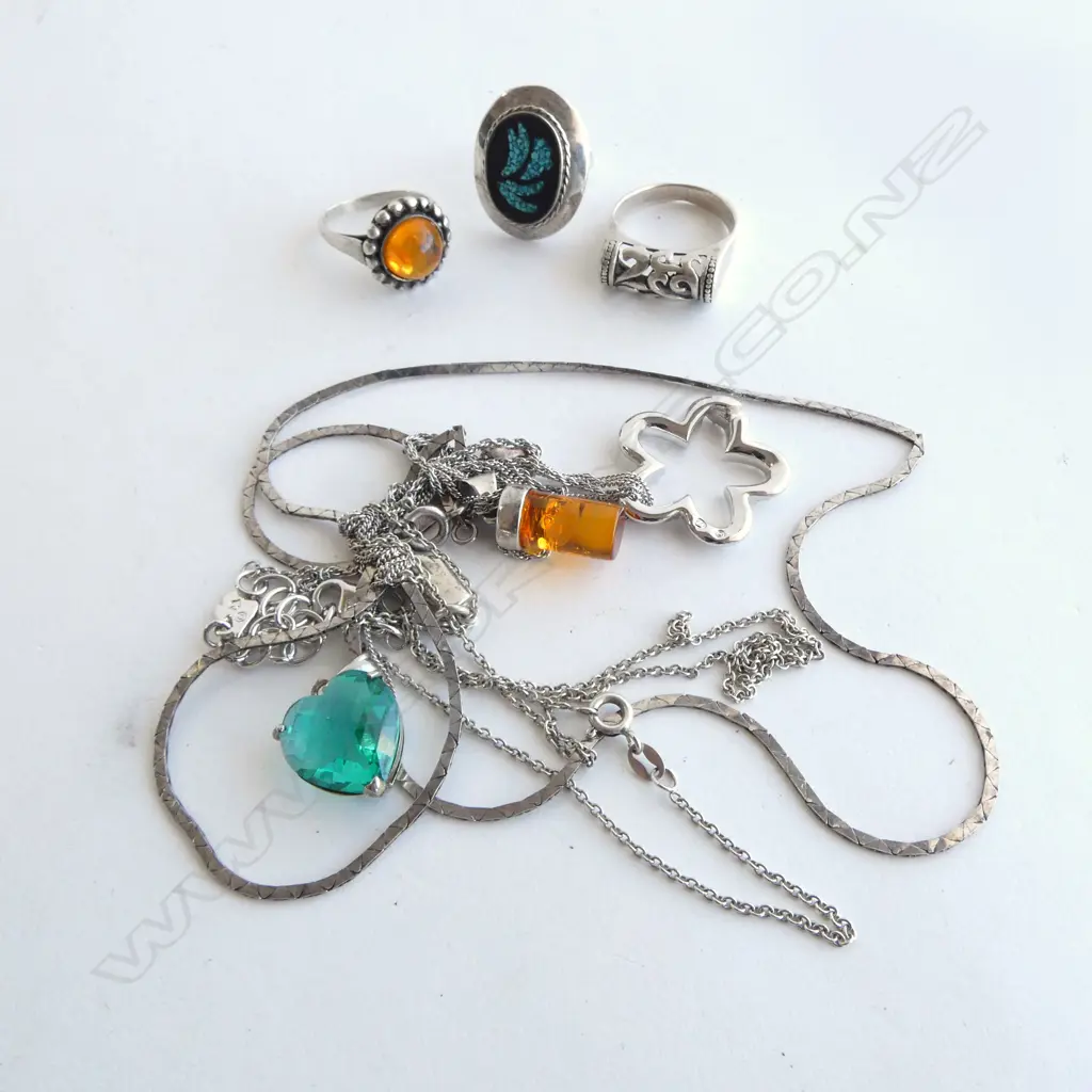 3 STG RINGS + 4 NECKLACES Image 1++