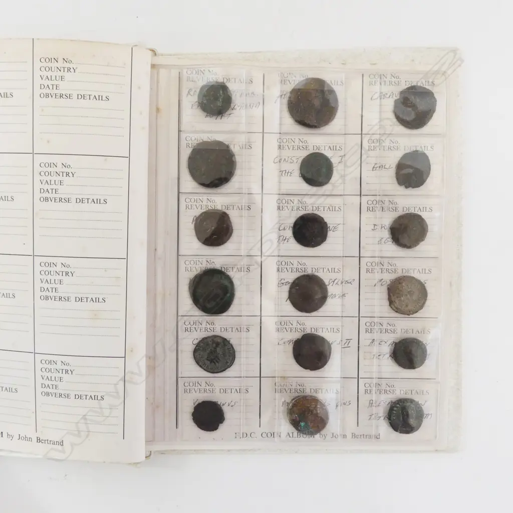 FOLDER OF ROMAN COINS Image 1++