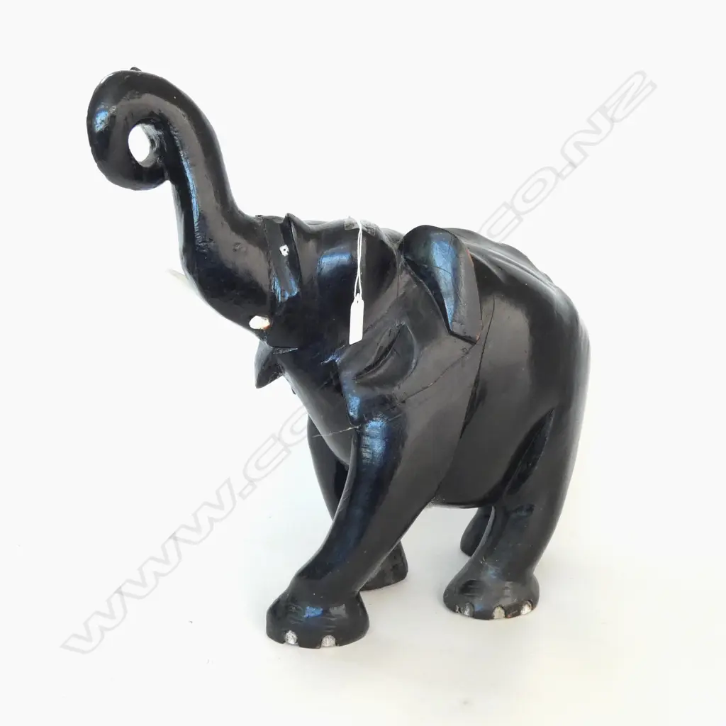 LGE CARVED EBONY ELEPHANT. Trunk raised repaired 1 tusk absent. H.460mm Image 1++