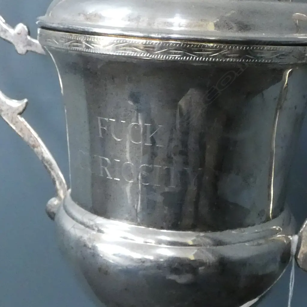 LG LIDDED SILVER PLATE TROPHY 'F#%K CURIOSITY' H.675mm Image 1++