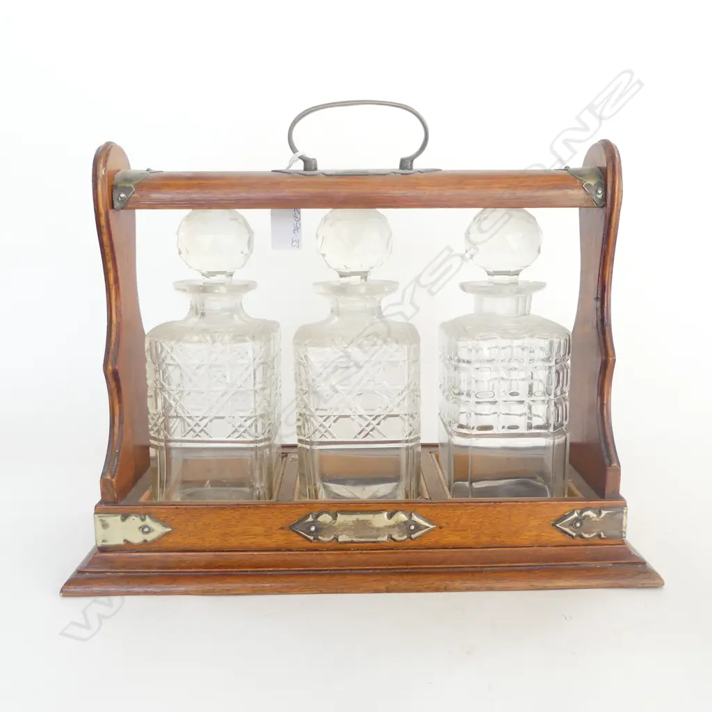 EDWARDIAN OAK FRAMED TANTULUS with 3 CUT CRYSTAL DECANTERS some chipping to 2 RIMS s/plate fittings Image 1++