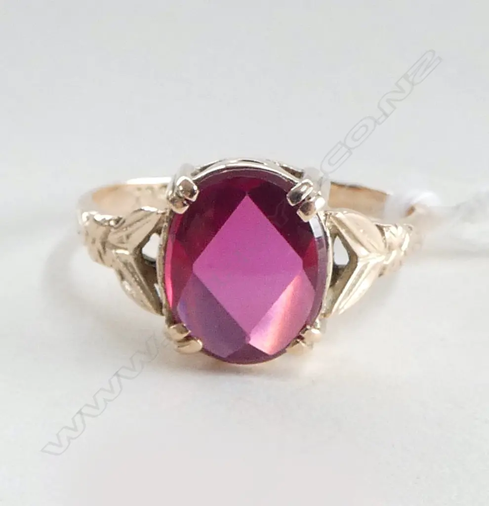 9CT ROSE GOLD AND SYNTHETIC RUBY RING (VALUATION)  3.60gm SIZE P Image 1++