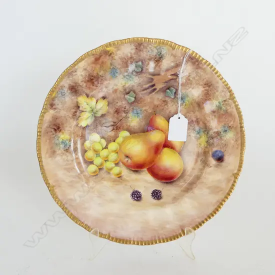 A fruit painted plate by Gerald Delaney