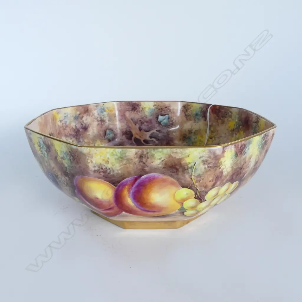 A fruit painted large octagonal bowl by Gerald Delaney Image 1++
