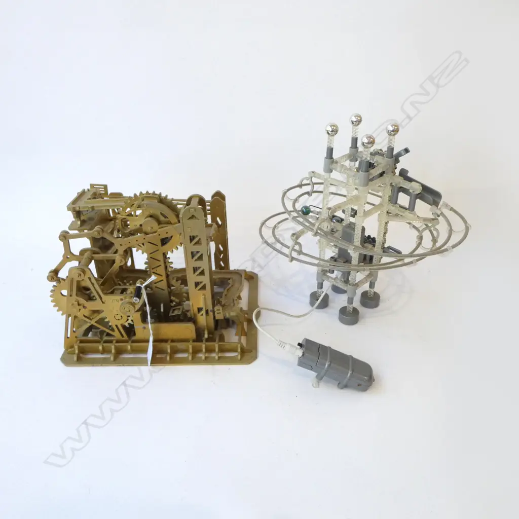 2 MECHANICAL BALL TOYS; 1 LASER CUT BY ROKR Image 1++
