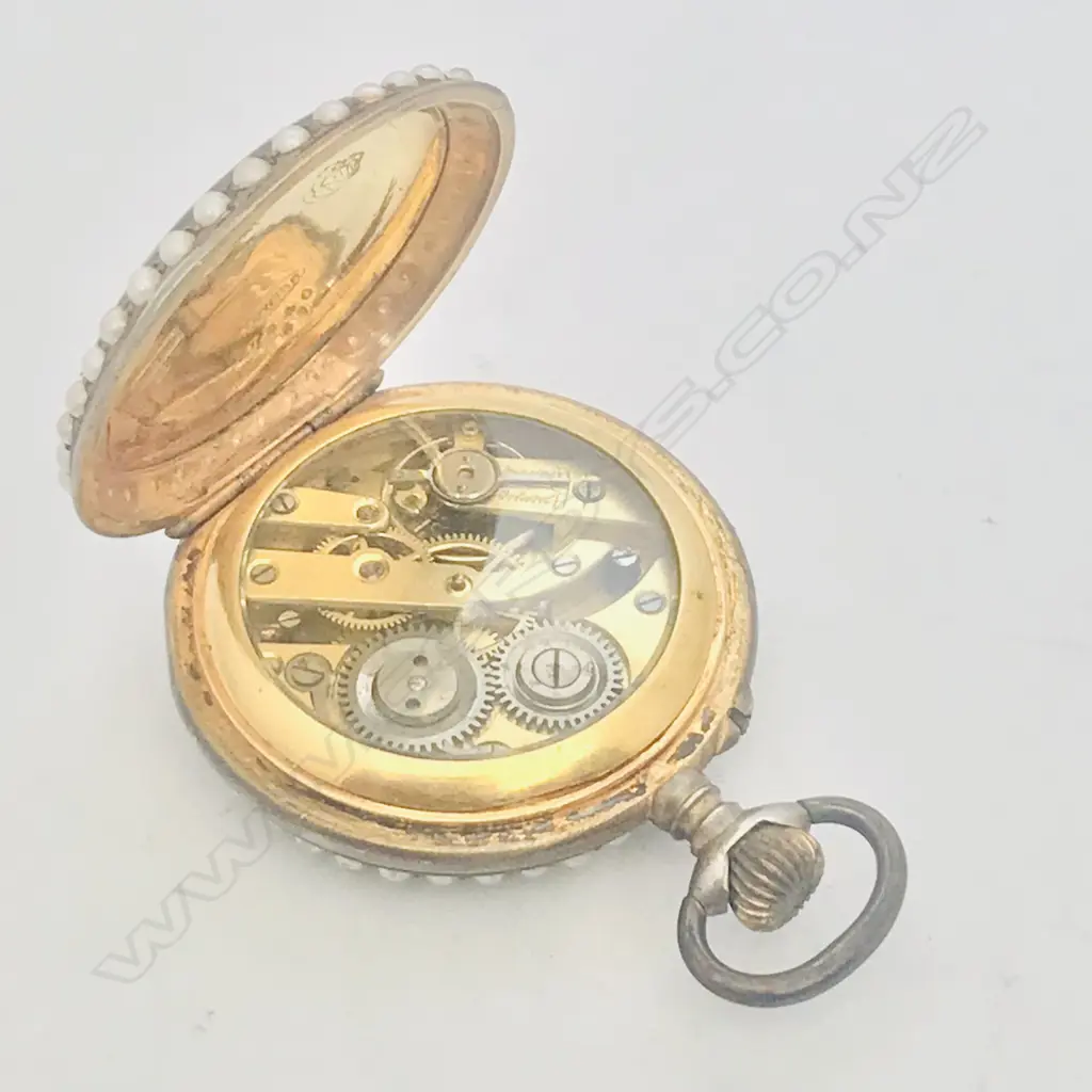 A late 19thC gilded silver lady’s fob watch with enamel decoration and set with seed pearls, Image 1++