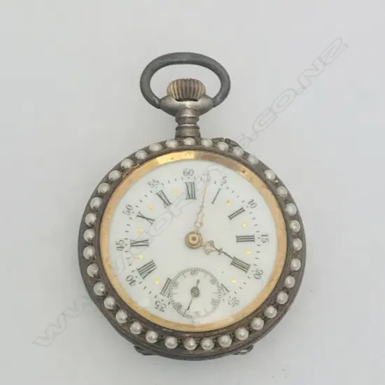 A late 19thC gilded silver lady’s fob watch with enamel decoration and set with seed pearls,
