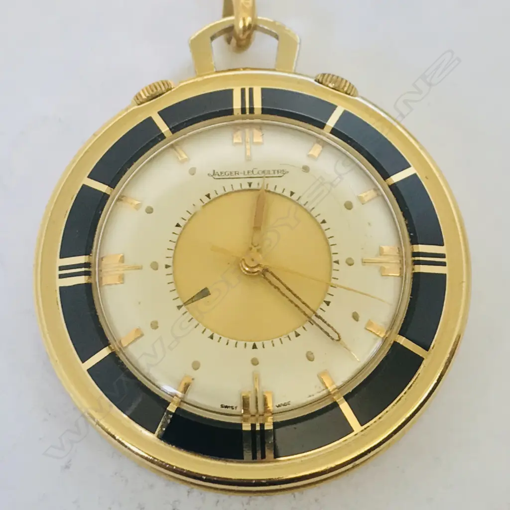 A Jaeger leCoultre 'Memovox' gold plated pocket travel watch, c.1956, with 18ct gold chain. Image 1++