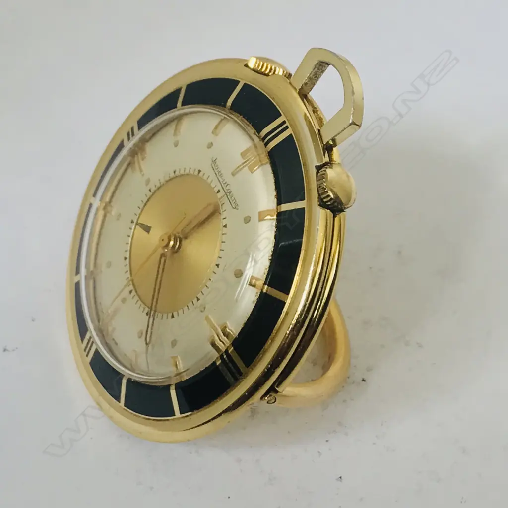 A Jaeger leCoultre 'Memovox' gold plated pocket travel watch, c.1956, with 18ct gold chain. Image 1++