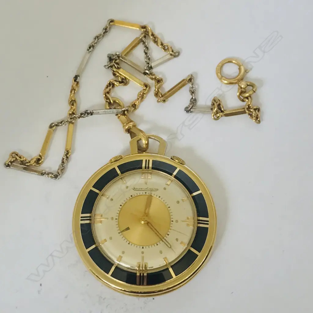A Jaeger leCoultre 'Memovox' gold plated pocket travel watch, c.1956, with 18ct gold chain. Image 1++