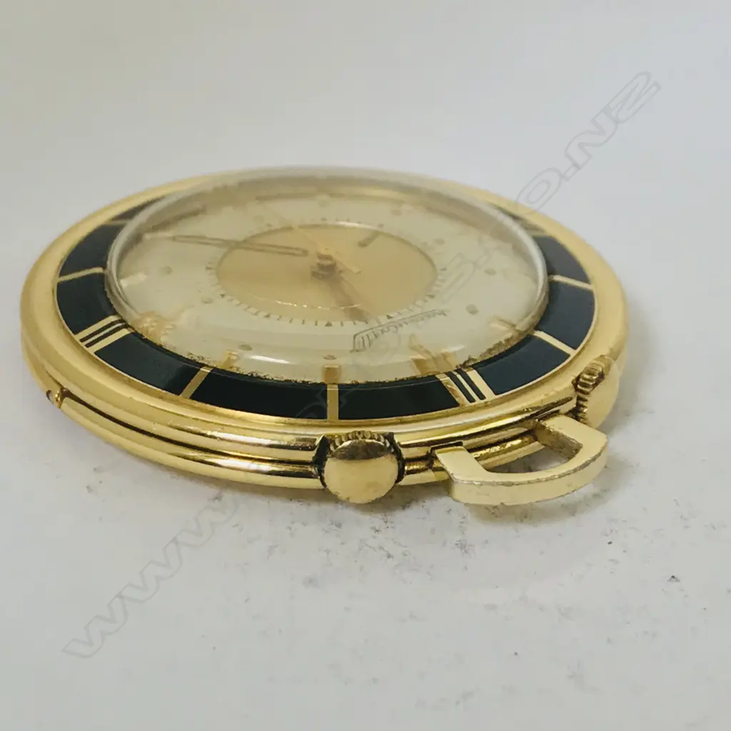 A Jaeger leCoultre 'Memovox' gold plated pocket travel watch, c.1956, with 18ct gold chain. Image 1++