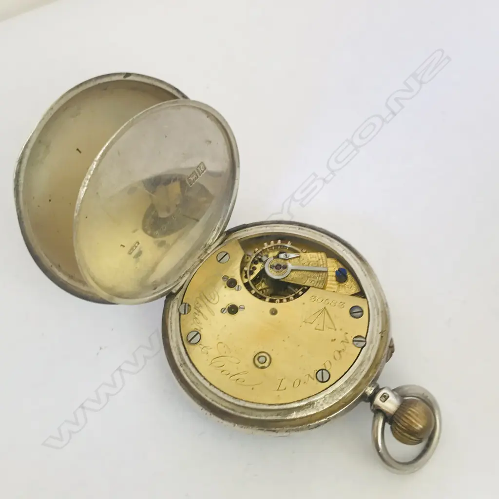Early 20thC silver open face pocket watch by Usher & Cole. London, number 30583, with military marked movement. Image 1++
