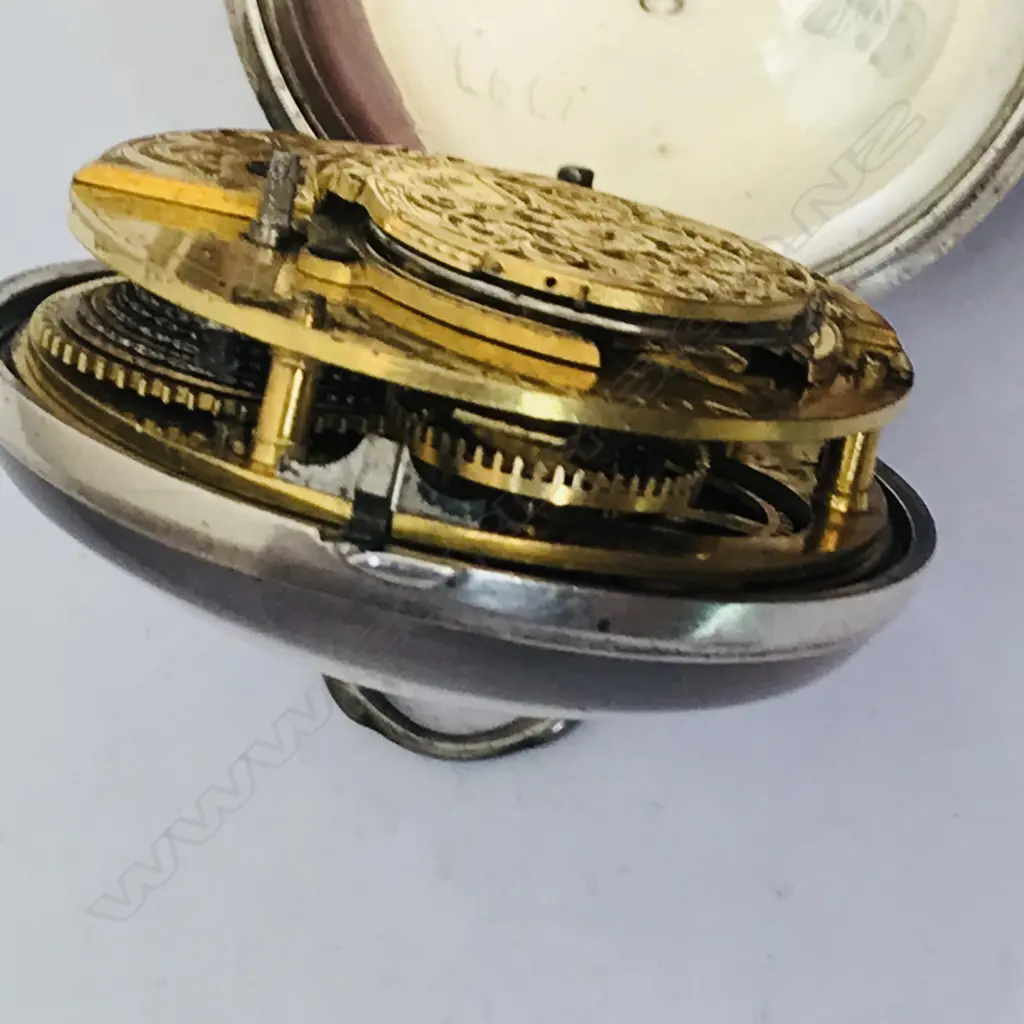 18thC silver pair case pocket watch, the dial with polychrome painted rustic scene to the centre. Image 1++